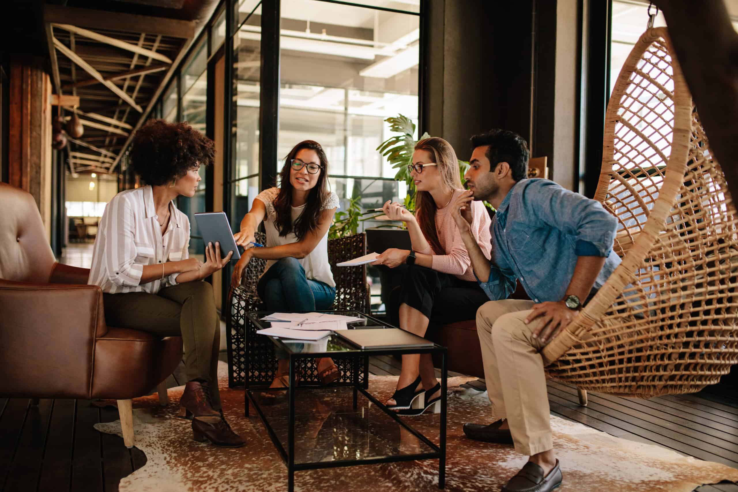 Crays team discussion in a hospitality work lounge