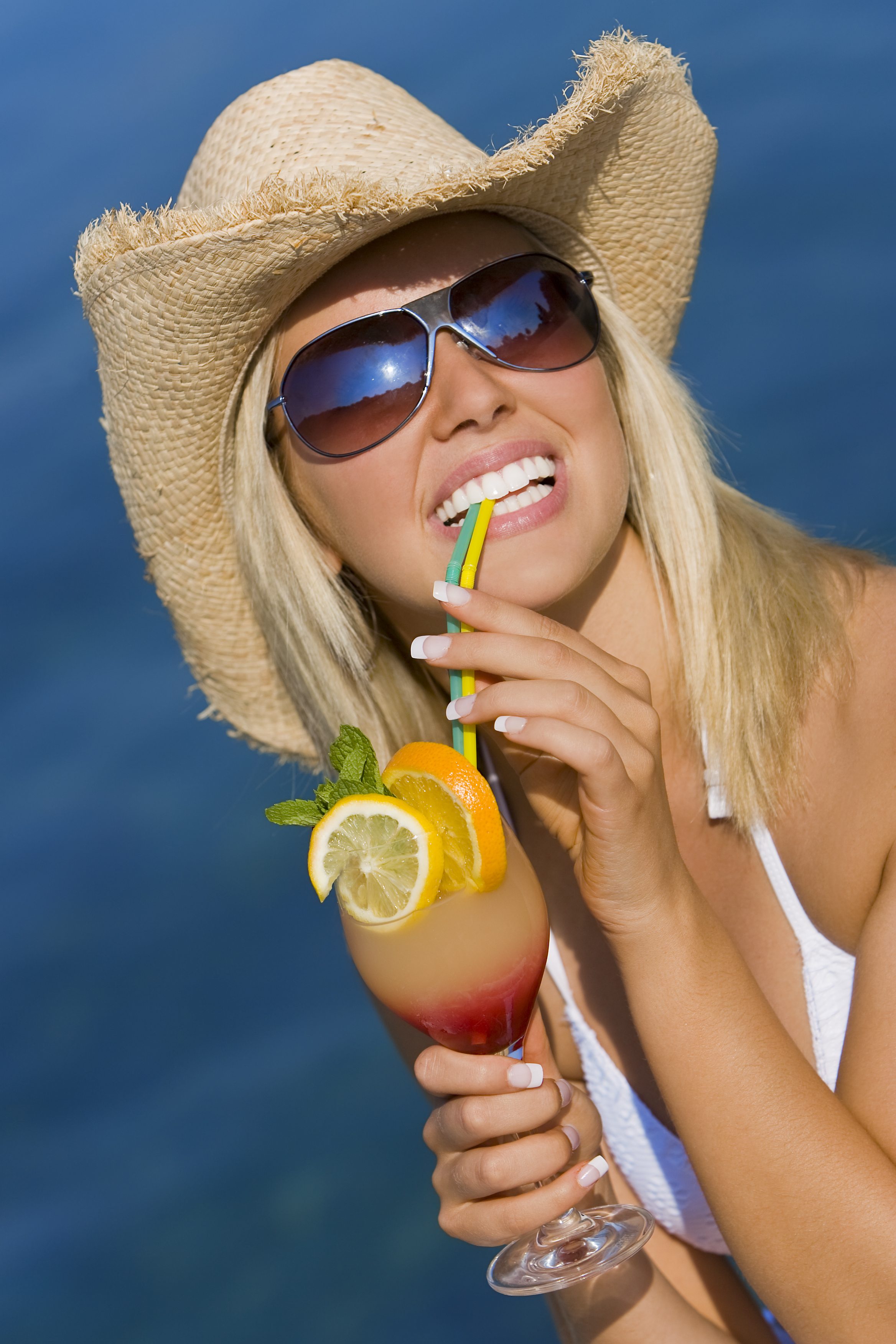 Premium lifestyle guest with a summer drink representing portable social identity